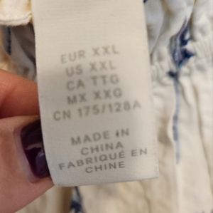 White maxi dress with blue corn flowers